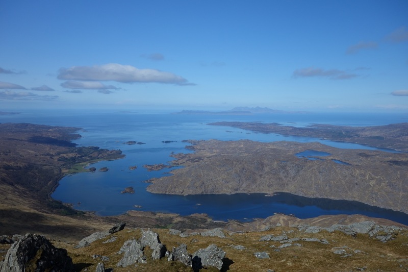 Looking West from the top of An Stac out towards Eigg and Rum